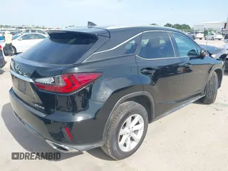 2016 Lexus RX 350 z VIN 2T2BZMCA4GC047800, wystawiony jako IAAI lot #42270406 z przebiegiem 112 181 mil mil oraz . Historia ofert i sprzedaży dostępna na DreamBid. Obrazek 4.