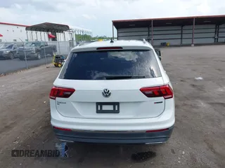 2021 Volkswagen Tiguan SE z VIN 3VV2B7AX5MM057743, wystawiony jako IAAI lot #42471192 z przebiegiem 80 133 mil mil oraz . Historia ofert i sprzedaży dostępna na DreamBid. Obrazek 16.