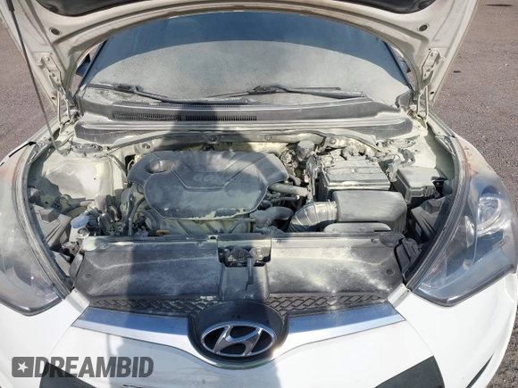 2012 Hyundai Veloster w/Gray Int z VIN KMHTC6AD6CU050886, wystawiony jako IAAI lot #42088918 z przebiegiem 126 007 mil mil oraz . Historia ofert i sprzedaży dostępna na DreamBid. Obrazek 6.