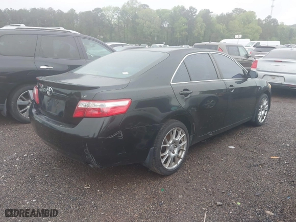 2007 Toyota Camry CE with VIN JTNBE46K573000686, listed as a IAAI auction lot 41971943 with 302,136 mi miles. Bid and sale history available at carsss.com. Image 4.