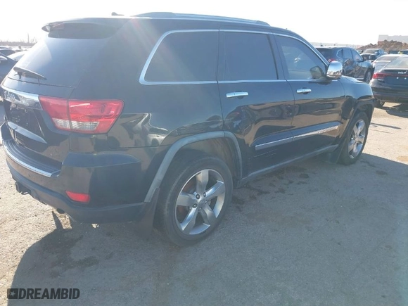 2011 Jeep Grand Cherokee Overland Summit with VIN 1J4RR6GT2BC560761, listed as a IAAI auction lot 41755210 with 161,139 mi miles. Bid and sale history available at carsss.com. Image 4.