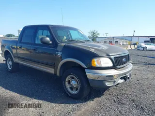 2003 Ford F-150 XLT z VIN 1FTRW08L63KC51053, wystawiony jako IAAI lot #42538965 z przebiegiem 167 383 mil mil oraz . Historia ofert i sprzedaży dostępna na DreamBid. Obrazek 1.