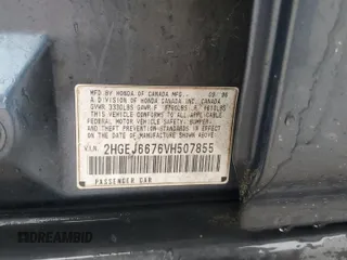 1997 Honda Civic LX z VIN 2HGEJ6676VH507855, wystawiony jako Copart lot #56684455 z przebiegiem 185 498 mil mil oraz Szkoda całkowita • Salvage title. Historia ofert i sprzedaży dostępna na DreamBid. Obrazek 12.