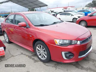 2016 Mitsubishi Lancer ES with VIN JA32U2FU4GU008882, listed as a IAAI auction lot 41600017 with 134,772 mi miles. Bid and sale history available at carsss.com. Image 1.