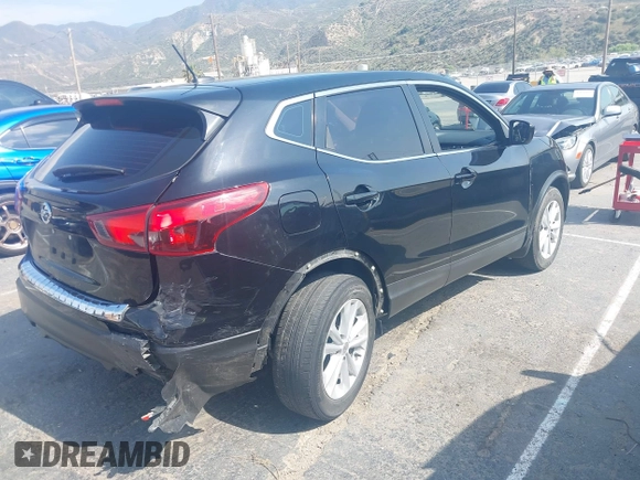2017 Nissan Rogue SV with VIN JN1BJ1CP6HW021810, listed as a IAAI auction lot 42174714 with 91,180 mi miles and . Bid and sale history available at DreamBid. Image 4.
