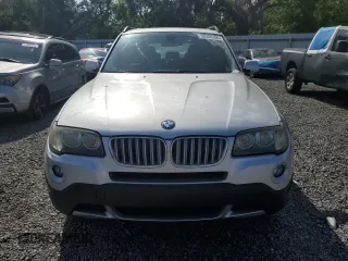 2009 BMW X3 xDrive30i with VIN WBXPC93459WJ27056, listed as a Copart auction lot 50306355 with 147,465 mi miles and Clean Title. Bid and sale history available at carsss.com. Image 5.