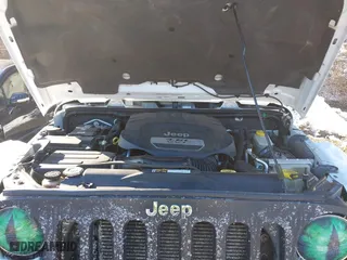 2012 Jeep Wrangler Arctic with VIN 1C4GJWBG9CL290847, listed as a IAAI auction lot 41281316 with 106,473 mi miles. Bid and sale history available at carsss.com. Image 10.