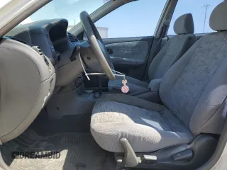 1998 Mitsubishi Mirage DE z VIN JA3AY26A1WU025398, wystawiony jako Copart lot #52533075 z przebiegiem 111 206 mil mil oraz Szkoda całkowita • Salvage title. Historia ofert i sprzedaży dostępna na DreamBid. Obrazek 7.