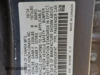 2025 Honda Civic Sport z VIN 2HGFE4F86SH309147, wystawiony jako Copart lot #56386475 z przebiegiem 9307 mil mil oraz Szkoda całkowita • Salvage title. Historia ofert i sprzedaży dostępna na DreamBid. Obrazek 12.