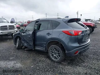 2013 Mazda CX-5 Sport with VIN JM3KE2BE7D0154040, listed as a IAAI auction lot 41842013 with 132,382 mi miles. Bid and sale history available at carsss.com. Image 3.
