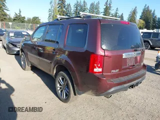 2014 Honda Pilot Touring with VIN 5FNYF4H93EB502117, listed as a IAAI auction lot 42086774 with 111,003 mi miles and . Bid and sale history available at carsss.com. Image 3.