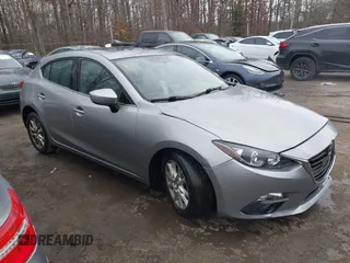 2015 Mazda 3 i Grand Touring z VIN 3MZBM1M75FM153731, wystawiony jako IAAI lot #41244225 z przebiegiem 228 623 mil mil oraz . Historia ofert i sprzedaży dostępna na DreamBid. Obrazek 1.