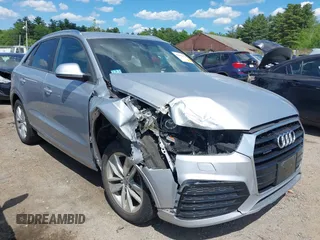 2018 Audi Q3 Premium with VIN WA1ECCFS0JR022112, listed as a IAAI auction lot 42356014 with 56,671 mi miles and . Bid and sale history available at DreamBid. Image 1.