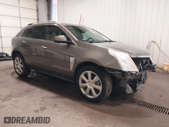 2014 Cadillac SRX Performance Collection z VIN 3GYFNFE38ES578066, wystawiony jako IAAI lot #42153023 z przebiegiem 134 009 mil mil oraz . Historia ofert i sprzedaży dostępna na DreamBid. Obrazek 1.