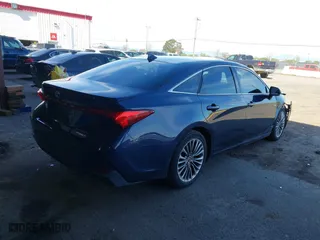 2019 Toyota Avalon Hybrid Limited with VIN 4T1B21FB5KU007633, listed as a IAAI auction lot 41615161 with 132,182 mi miles. Bid and sale history available at carsss.com. Image 4.