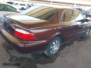 2002 Mazda 626 LX with VIN 1YVGF22C225291987, listed as a IAAI auction lot 41863018 with 111,362 mi miles. Bid and sale history available at carsss.com. Image 4.