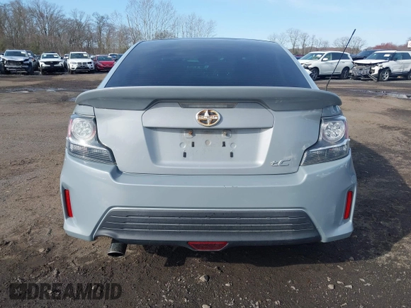 2014 Scion tC z VIN JTKJF5C71E3081033, wystawiony jako IAAI lot #41928949 z przebiegiem 144 112 mil mil oraz . Historia ofert i sprzedaży dostępna na DreamBid. Obrazek 16.