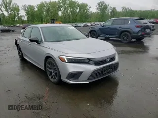 2023 Honda Civic Sport z VIN 2HGFE2F52PH525336, wystawiony jako Copart lot #58277175 z przebiegiem 30 416 mil mil oraz Szkoda całkowita • Salvage title. Historia ofert i sprzedaży dostępna na DreamBid. Obrazek 13.
