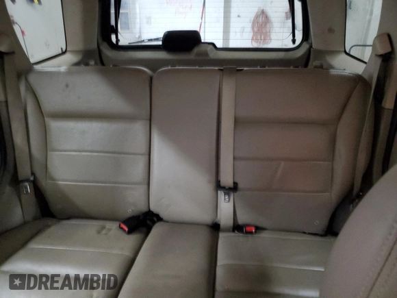 2005 Ford Escape Limited with VIN 1FMYU04145KA78041, listed as a Copart auction lot 70222184 with 113,943 mi miles and Salvage Title. Bid and sale history available at carsss.com. Image 10.