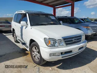 2003 Lexus LX with VIN JTJHT00WX33523623, listed as a IAAI auction lot 42028889 with 317,700 mi miles. Bid and sale history available at carsss.com. Image 1.