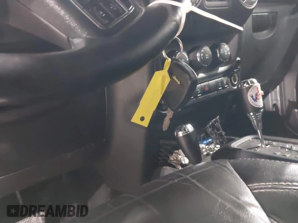 2014 Jeep Wrangler Unlimited Sahara with VIN 1C4BJWEG5EL164350, listed as a IAAI auction lot 42018586 with 113,222 mi miles. Bid and sale history available at carsss.com. Image 11.