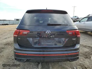2023 Volkswagen Tiguan SE R-Line Black with VIN 3VVCB7AX9PM131559, listed as a Copart auction lot 44711665 with 28,166 mi miles and Salvage Title. Bid and sale history available at carsss.com. Image 6.