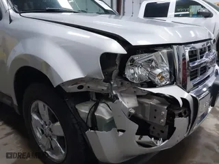 2009 Ford Escape Limited with VIN 1FMCU94G29KC05247, listed as a IAAI auction lot 41417395 with 204,256 mi miles. Bid and sale history available at carsss.com. Image 6.