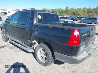 2004 Ford Explorer Sport Trac XLS z VIN 1FMZU67K04UB59407, wystawiony jako IAAI lot #41849511 z przebiegiem 235 858 mil mil oraz . Historia ofert i sprzedaży dostępna na DreamBid. Obrazek 3.