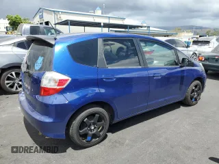 2009 Honda Fit with VIN JHMGE882X9C003678, listed as a Copart auction lot 56688265 with 141,003 mi miles and Salvage title. Bid and sale history available at DreamBid. Image 3.
