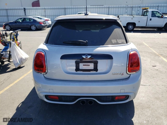 2016 MINI Cooper Hardtop 4 Door S with VIN WMWXU3C55G2D30551, listed as a Copart auction lot 72732444 with 102,316 mi miles and Salvage Title. Bid and sale history available at carsss.com. Image 6.