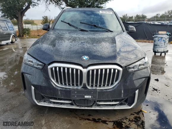 2024 BMW X5 xDrive40i with VIN 5UX23EU00R9U62752, listed as a Copart auction lot 85104184 with 23,547 mi miles and Salvage Title. Bid and sale history available at carsss.com. Image 5.
