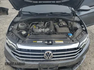 2021 Volkswagen Jetta S z VIN 3VWC57BUXMM004421, wystawiony jako Copart lot #81518974 z przebiegiem 98 518 mil mil oraz Szkoda całkowita • Salvage title. Historia ofert i sprzedaży dostępna na DreamBid. Obrazek 11.