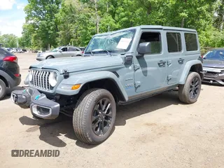 2024 Jeep Wrangler Sahara with VIN 1C4RJXP68RW270112, listed as a IAAI auction lot 42193921 with 23,792 mi miles and . Bid and sale history available at carsss.com. Image 2.