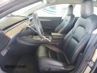 2023 Tesla Model 3 with VIN 5YJ3E1EA4PF456228, listed as a Copart auction lot 61442085 with 121,173 mi miles and Clean title. Bid and sale history available at DreamBid. Image 7.