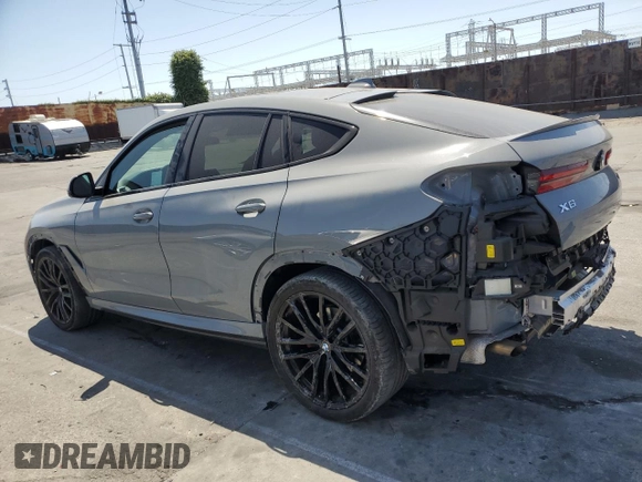 2022 BMW X6 xDrive40i z VIN 5UXCY6C01N9M95573, wystawiony jako Copart lot #54049805 z przebiegiem 24 031 mil mil oraz Szkoda całkowita • Salvage title. Historia ofert i sprzedaży dostępna na DreamBid. Obrazek 2.