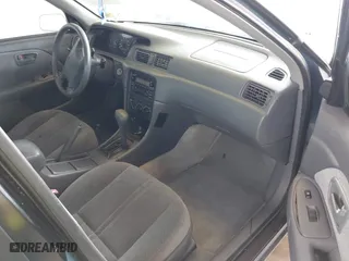 2000 Toyota Camry CE with VIN 4T1BG22KXYU923956, listed as a IAAI auction lot 41937950 with 101,539 mi miles. Bid and sale history available at carsss.com. Image 5.