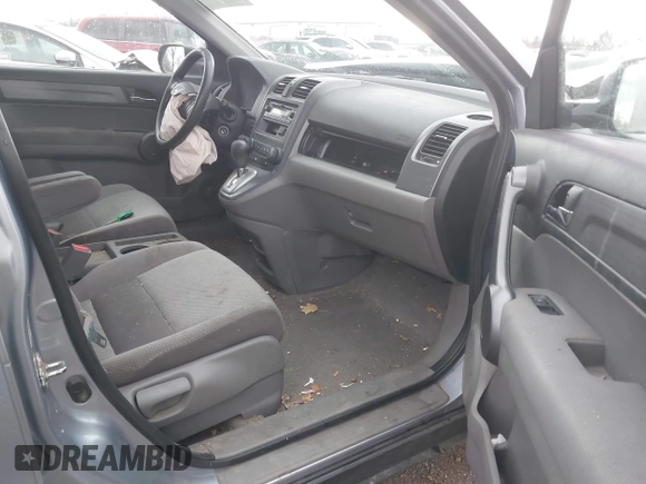 2009 Honda CR-V LX with VIN 5J6RE48339L016522, listed as a IAAI auction lot 40783609 with 209,891 mi miles. Bid and sale history available at carsss.com. Image 5.