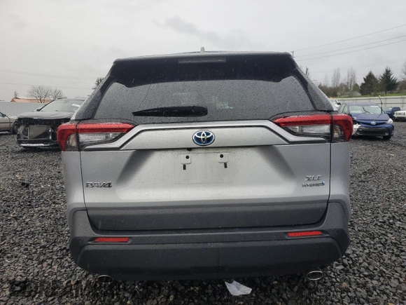 2024 Toyota RAV4 Hybrid XLE Premium with VIN 2T3B6RFV6RW066043, listed as a Copart auction lot 43470115 with 9,454 mi miles and Salvage Title. Bid and sale history available at DreamBid. Image 6.