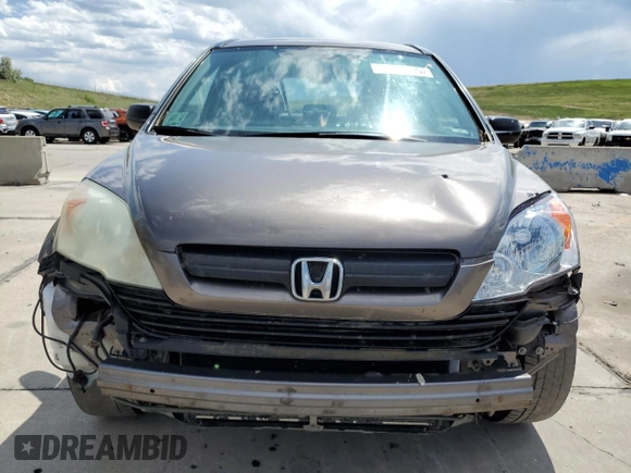 2009 Honda CR-V LX z VIN 5J6RE48399L025855, wystawiony jako Copart lot #60359355 z przebiegiem 262 261 mil mil oraz Czysty tytuł • Clean title. Historia ofert i sprzedaży dostępna na DreamBid. Obrazek 5.