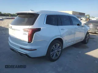 2020 Cadillac XT6 FWD Premium Luxury z VIN 1GYKPCRS9LZ107178, wystawiony jako Copart lot #72359154 z przebiegiem 154 427 mil mil oraz Nie do naprawy. Historia ofert i sprzedaży dostępna na DreamBid. Obrazek 3.