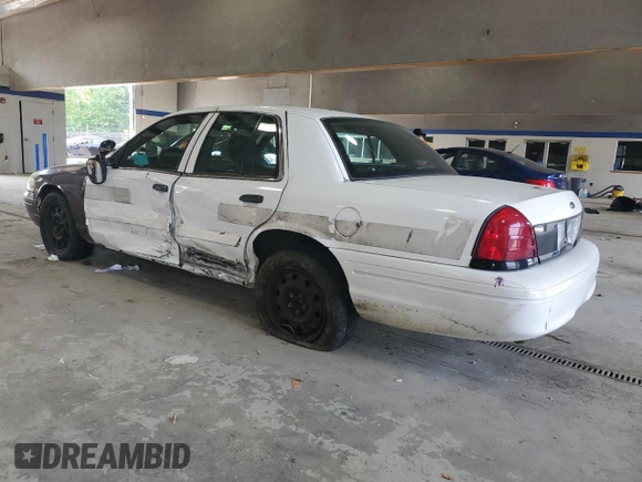 2011 Ford Police Interceptor z VIN 2FABP7BV5BX166689, wystawiony jako Copart lot #59597015 z przebiegiem 154 986 mil mil oraz Szkoda całkowita • Salvage title. Historia ofert i sprzedaży dostępna na DreamBid. Obrazek 2.