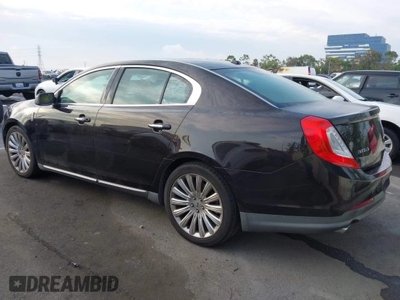 2013 Lincoln MKS with VIN 1LNHL9DK6DG608673, listed as a IAAI auction lot 42756289 with 103,118 mi miles and . Bid and sale history available at DreamBid. Image 3.