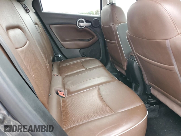 2017 FIAT 500X Lounge z VIN ZFBCFYDB9HP624651, wystawiony jako Copart lot #73388714 z przebiegiem 70 597 mil mil oraz Szkoda całkowita • Salvage title. Historia ofert i sprzedaży dostępna na DreamBid. Obrazek 10.