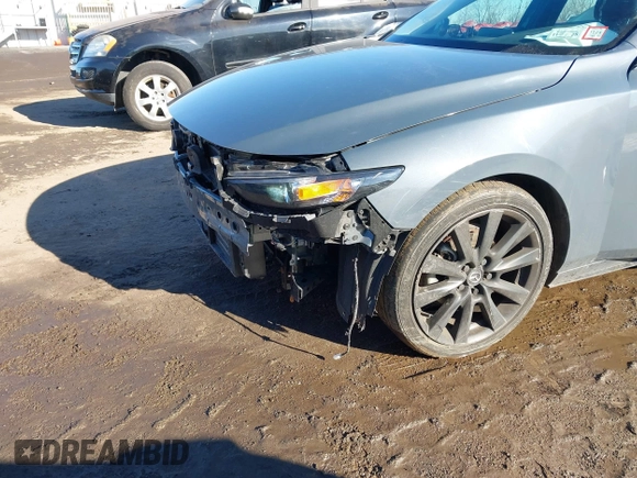 2023 Mazda 3 S Preferred with VIN 3MZBPACM2PM384666, listed as a IAAI auction lot 41482271 with 37,746 mi miles and . Bid and sale history available at DreamBid. Image 18.