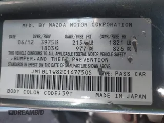 2012 Mazda 3 i Grand Touring with VIN JM1BL1W82C1677505, listed as a IAAI auction lot 41684777 with 124,454 mi miles and . Bid and sale history available at DreamBid. Image 9.