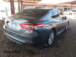 2020 Toyota Camry LE with VIN 4T1C11AK6LU919672, listed as a IAAI auction lot 41726103 with 66,367 mi miles. Bid and sale history available at carsss.com. Image 4.
