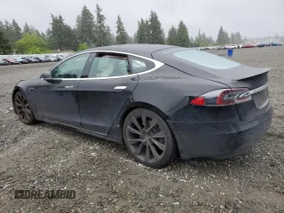 2019 Tesla Model S 75D with VIN 5YJSA1E28KF349241, listed as a Copart auction lot 55279595 with 77,005 mi miles and Salvage title. Bid and sale history available at DreamBid. Image 2.