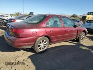 1998 Ford Contour SE z VIN 1FAFP6639WK279655, wystawiony jako Copart lot #77660774 z przebiegiem 89 161 mil mil oraz Szkoda całkowita • Salvage title. Historia ofert i sprzedaży dostępna na DreamBid. Obrazek 3.