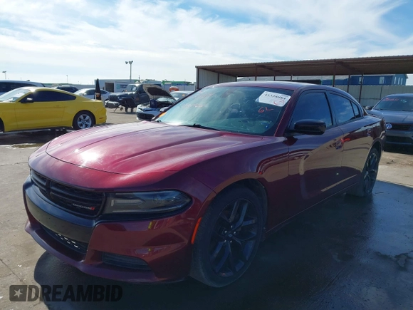 2020 Dodge Charger SXT with VIN 2C3CDXBG3LH104815, listed as a IAAI auction lot 41328084 with 130,322 mi miles and . Bid and sale history available at DreamBid. Image 2.