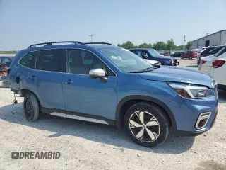 2021 Subaru Forester Touring with VIN JF2SKAXC4MH514225, listed as a Copart auction lot 60240355 with 55,660 mi miles and Salvage title. Bid and sale history available at DreamBid. Image 4.